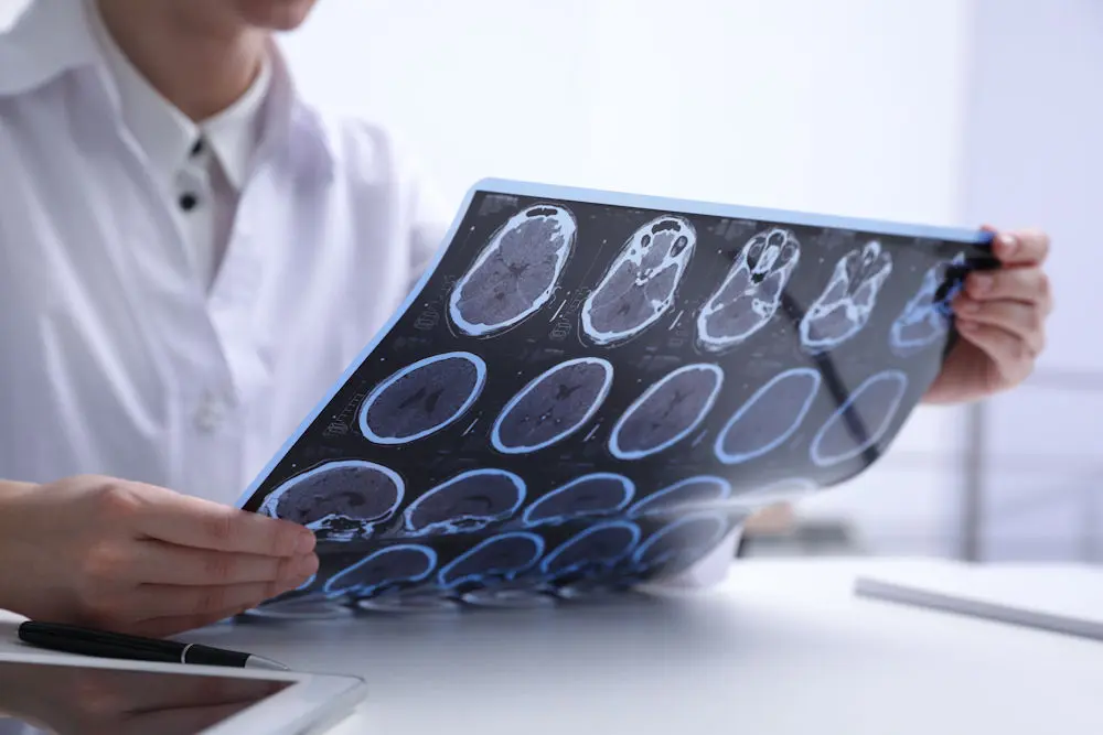 a doctor looking at MRI result